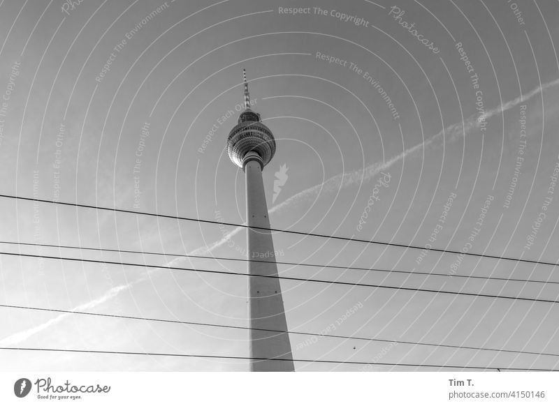 The Berlin TV Tower from below Overhead line Television tower Middle Downtown Berlin Landmark Alexanderplatz Sky Capital city Architecture Tourist Attraction