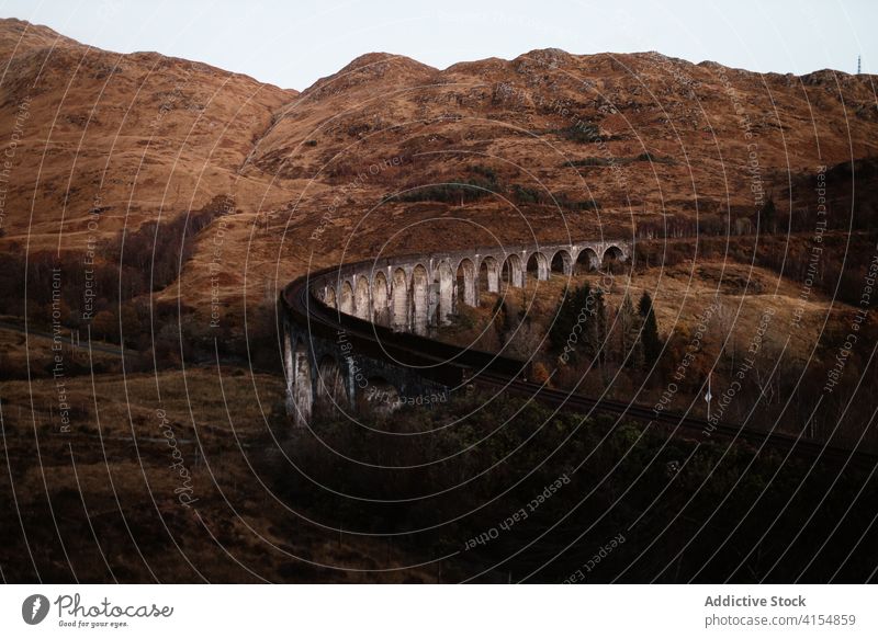 Old stone viaduct in mountains railway railroad highland glenfinnan viaduct scenery autumn breathtaking construction scottish highlands scotland uk