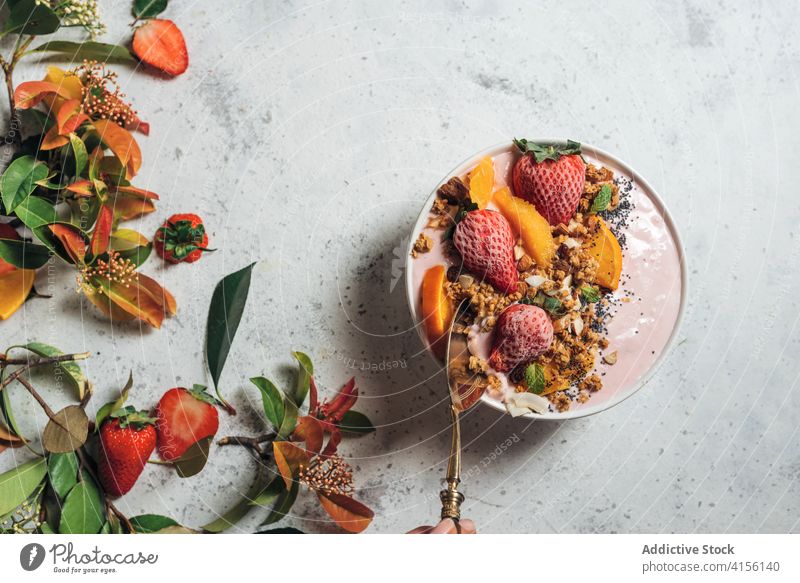 Crop woman with smoothie bowl breakfast healthy food table morning raw food diet female fresh berry fruit organic meal yummy sit nutrition vitamin colorful home