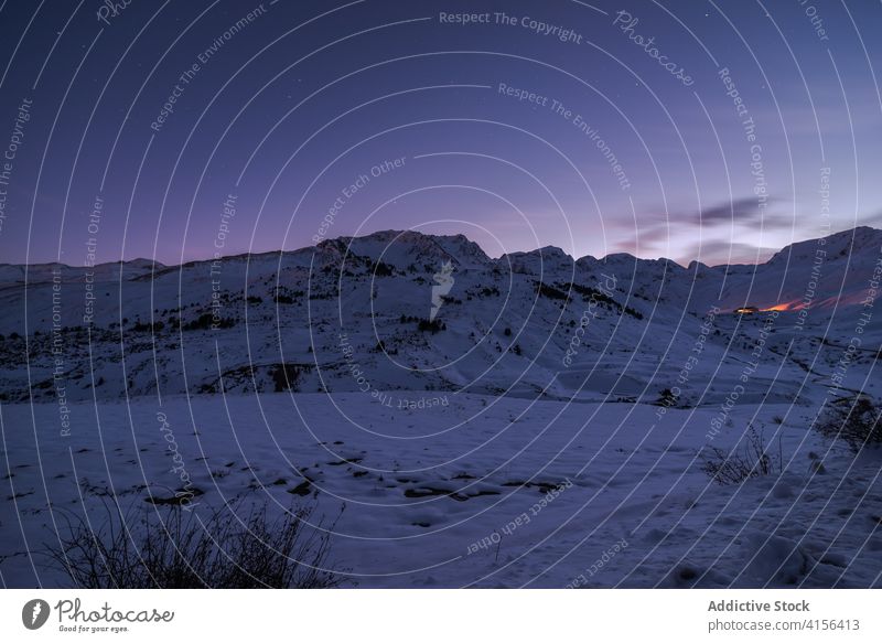 Amazing landscape of mountains in winter snow range night sky starry white season pyrenees huesca spain scenic scenery picturesque cold frozen tranquil majestic