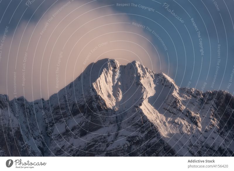 Snowy mountain ridge in winter range snow cloudy sky dramatic highland landscape amazing pyrenees huesca spain scenery spectacular cold nature environment