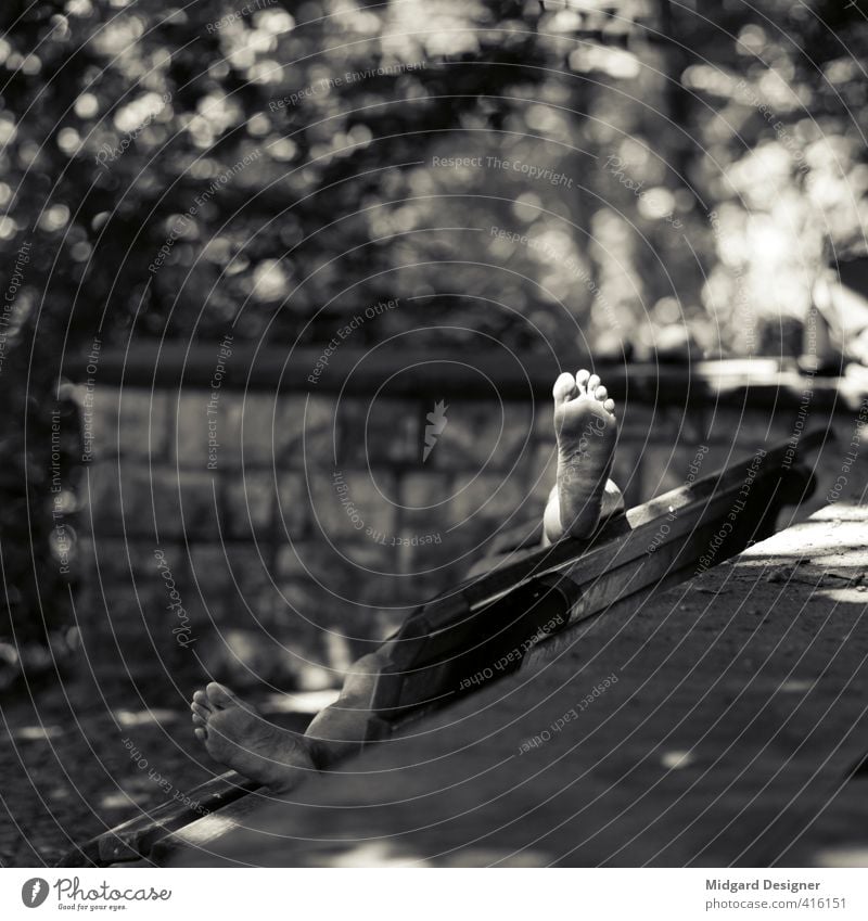 sunbath Human being Masculine Feet 1 Break Bench Tramp Feet up Park Sunlight Sunbathing Legs Blur Wall (barrier) Toes Black & white photo Exterior shot