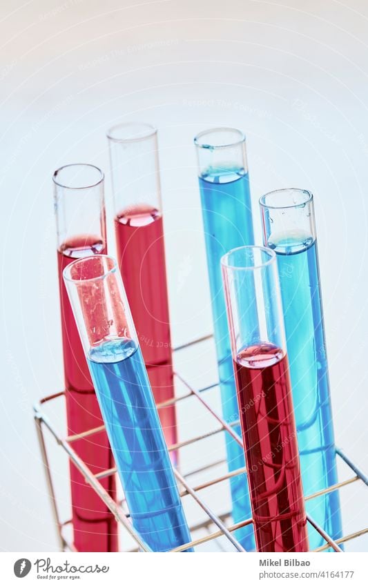 Test tubes with dye liquid in a laboratory. Science concept. research science scientific scientific research Testing & Control test knowledge background school