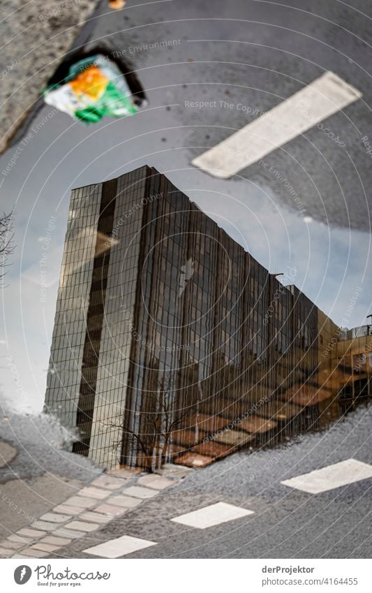 Reflection of the Axel Springer building with a chip bag Structures and shapes architectural photography architecture Central perspective Deep depth of field