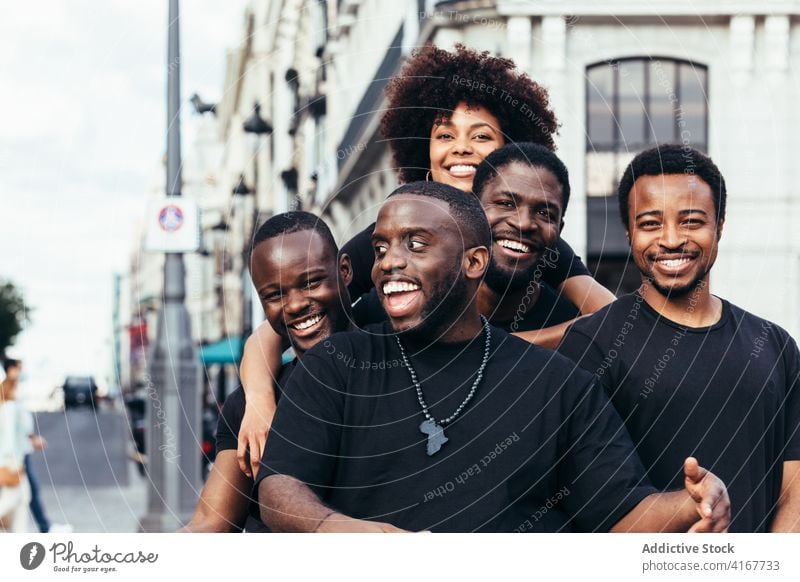 Happy friends hanging out in the city black people lifestyle african happy together friendship holiday fun summer young couple female smiling outdoors american