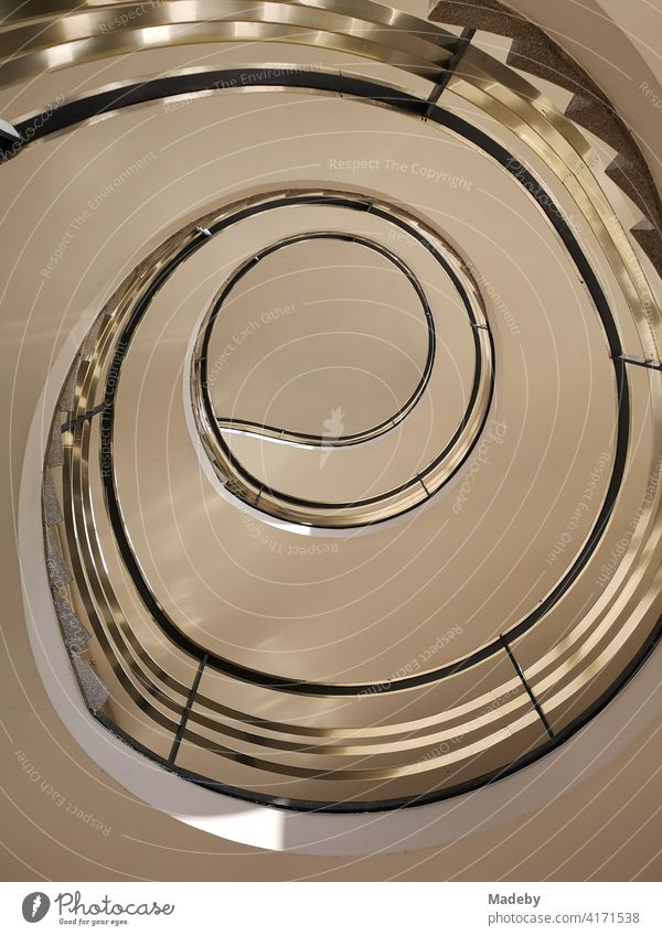 Curved staircase in the style of the architecture of the fifties in an office building in the West End of Frankfurt am Main in Hesse Stairs Staircase (Hallway)