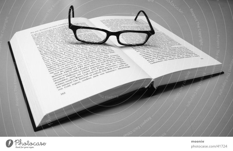 Break from Putin's Bio Book Eyeglasses Reading Think Leisure and hobbies Black & white photo ponder
