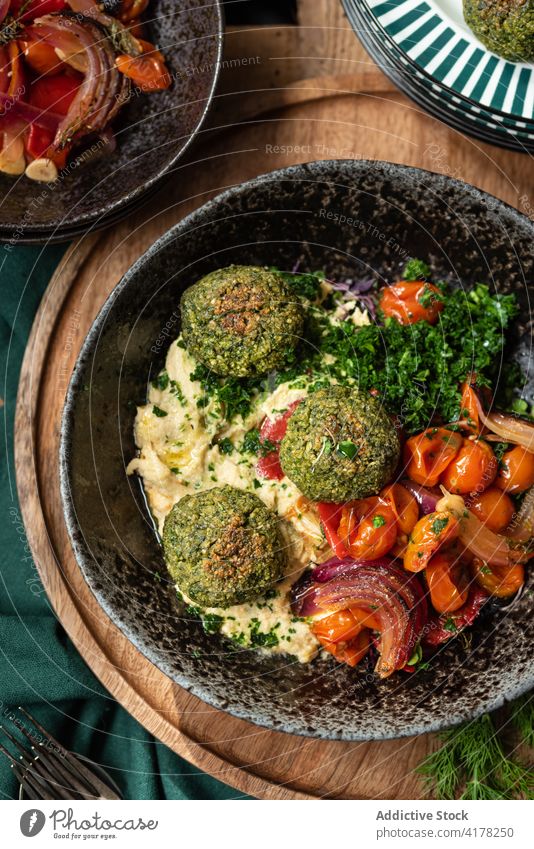 Falafel with hummus and vegetables in bowl falafel vegetarian tradition food dish meal dinner culinary middle east mediterranean delicious cuisine healthy