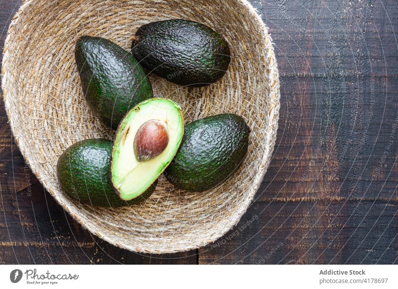 Bowl with avocados placed on wooden table recipe fresh tradition food cuisine vegetable meal vegetarian culinary cook natural kitchen authentic gastronomy