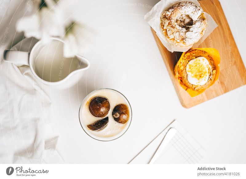 Delicious chocolate bombs melting in glass of hot milk beverage drink dessert blend sweet treat cupcake fresh kitchen jug delicious healthy warm ingredient