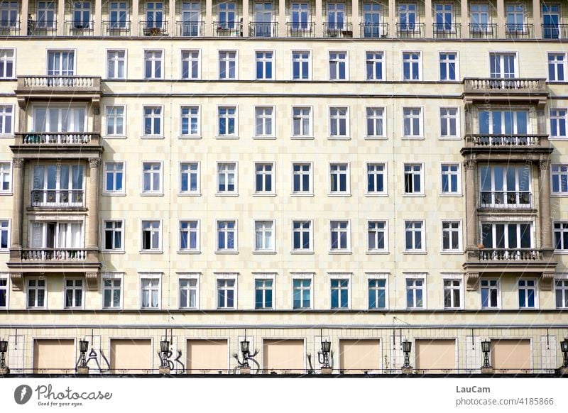 Candy-striper style apartment block on Frankfurter Allee in Berlin block of flats sugar cake style Facade house facade GDR architecture Window lamps Apartments