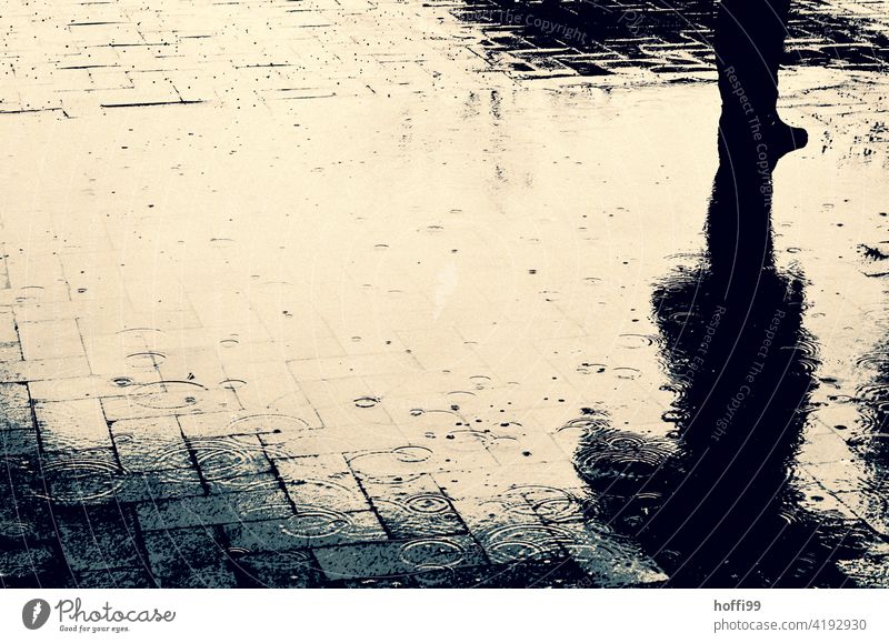 abstract rain puddle with human Rain Puddle puddle mirroring puddle picture Abstract chatter raindrops Bad weather Drops of water Water Nature Wet Weather