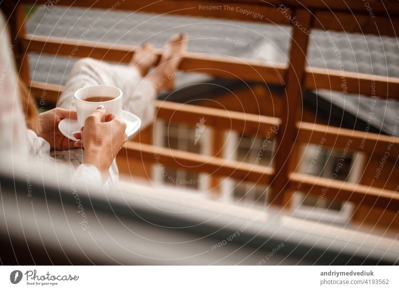 Winter woman with cup of hot tea Stock Photo by ©gpointstudio 52436417