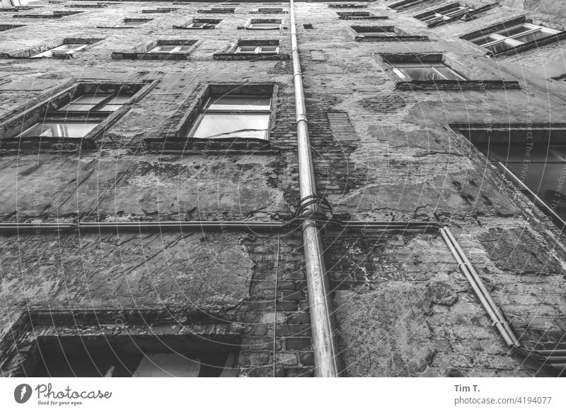 Backyard Berlin Prenzlauer Berg b/w bnw Courtyard Upward Exterior shot Town Old building unrefurbished Downtown Capital city Deserted Old town Day Building