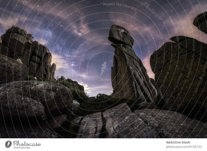 Big rocks in starry night nature sky milky way plant summer adventure landscape stone dark journey mountain picturesque cliff astronomy beautiful amazing