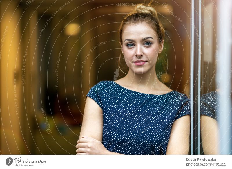 Portrait of confident businesswoman in office girl people Entrepreneur successful professional young adult female lifestyle indoors millennial attractive