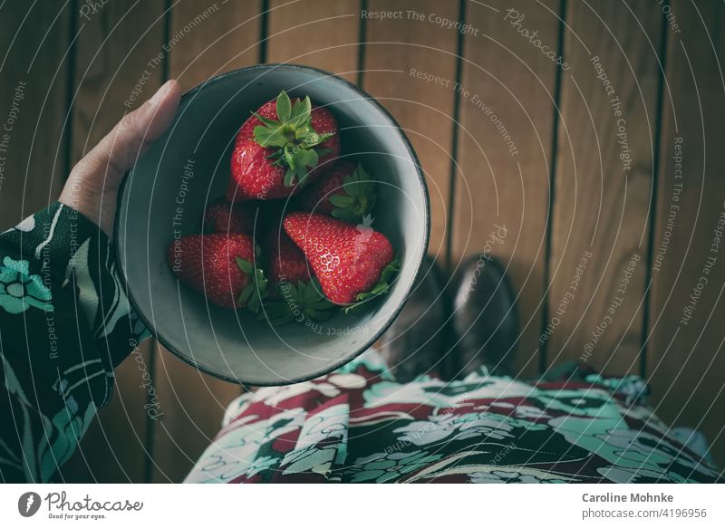 Woman holding a bowl of fresh crisp strawberries in her hand Strawberry shell Healthy Eating culinary arts Fruit Vitamin Breakfast Food Nutrition