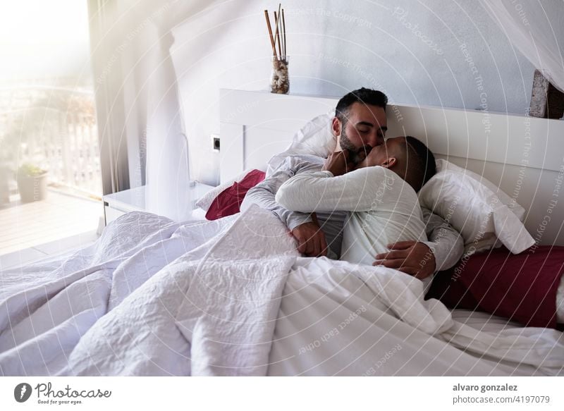 an interracial gay couple in bed Love - Emotion Adults Only Homosexual Cozy Only Men Domestic Life Two People Multi-Ethnic Group Home Interior Lifestyles