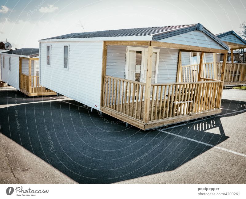 mobile beach houses are waiting for their use beach cottage Beach hut Mobile Mobility Mobilie houses Ocean Vacation & Travel Exterior shot coast Colour photo