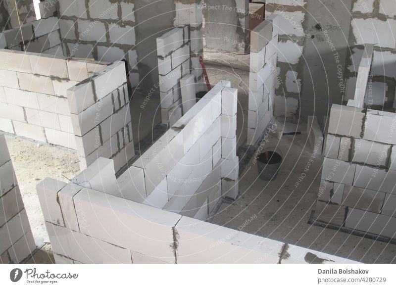 top view of walls under construction of foam blocks in walls of country house materials entrance reinforced contemporary housing perspective frame repair