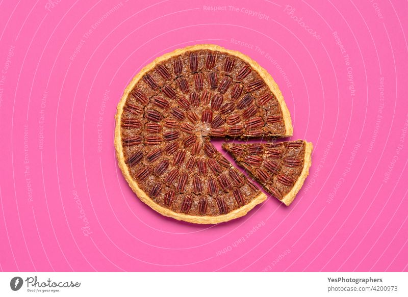 Pecan pie above view, isolated on a pink background. american autumn baked brown business cake chart christmas color copy space corn syrup crust cuisine cut out