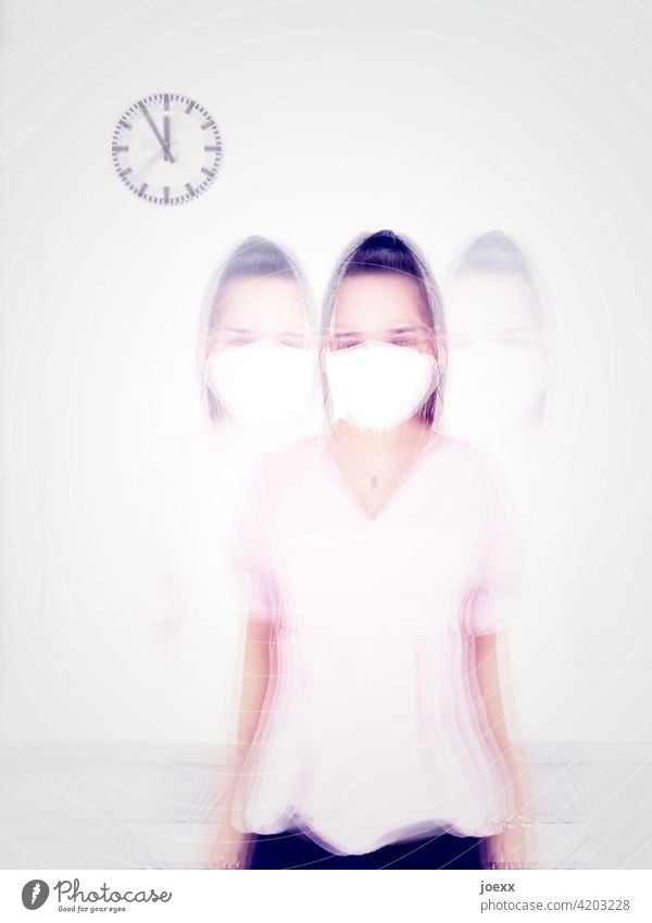 Woman with mask, blurred Clock Mask motion blur five to twelve blurriness