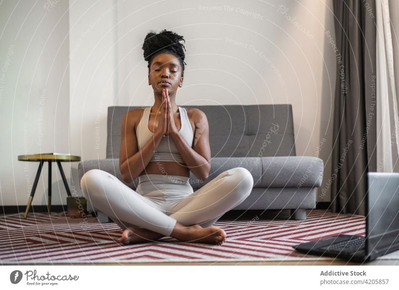 Young Man Practicing Yoga, Meditation Exercises. Guy Does Lotus Pose For  Relaxation, Sitting On Mat At Gym. Healthy Lifestyle, Copy Space Stock  Photo, Picture and Royalty Free Image. Image 97988906.