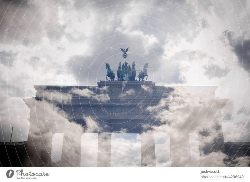 Clouds over Brandenburg Gate with commemorative colors Landmark Fantastic Experimental Double exposure Illusion Surrealism Reaction Pariser Platz Berlin Sky