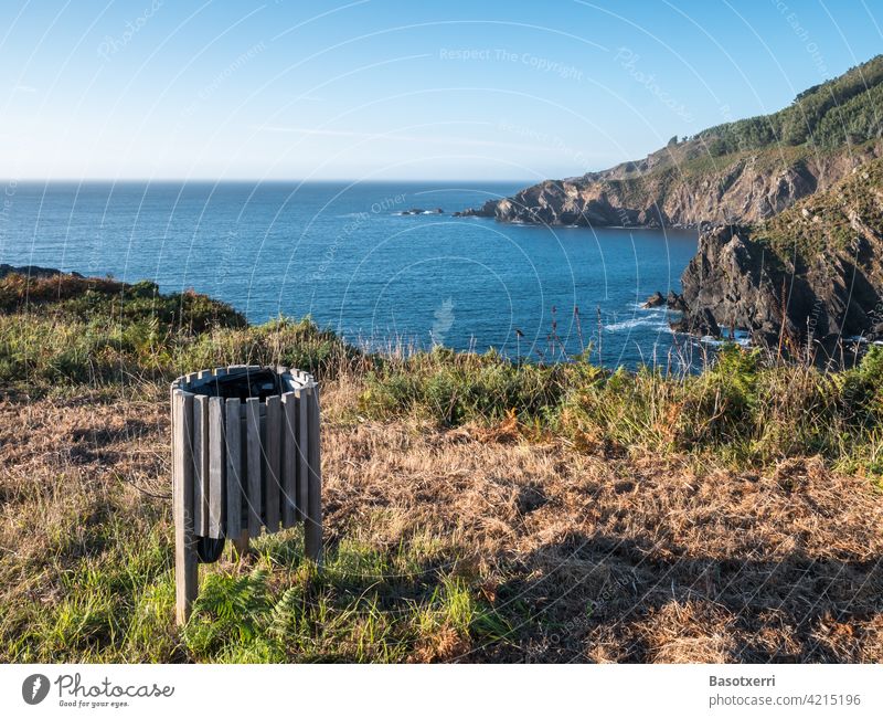 The best trash can in the world. Sunset on the Atlantic coast near Cedeira, Rías Altas, Galicia, Spain. litter bins Wastepaper basket waste Throw away Trash