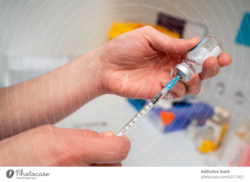 Small Syringe With Long Needle Stock Photo, Picture and Royalty