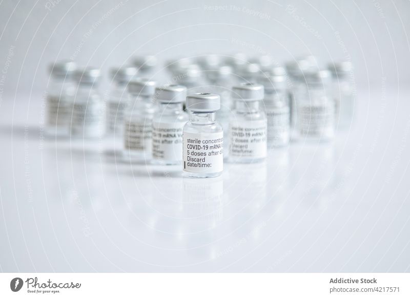 Close-up of some vials with the coronavirus vaccine on a white background Vial isolated ampoule bottle medical health medicine treatment pharmacy care