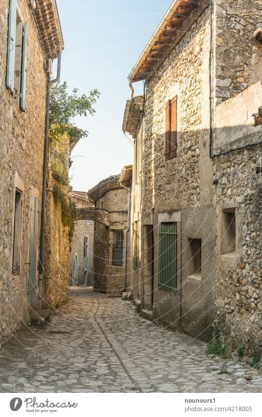 Alley in an old french village Street Traffic infrastructure Shadow Cobblestones Colour photo Paving stone Deserted Exterior shot Stone Lanes & trails Light