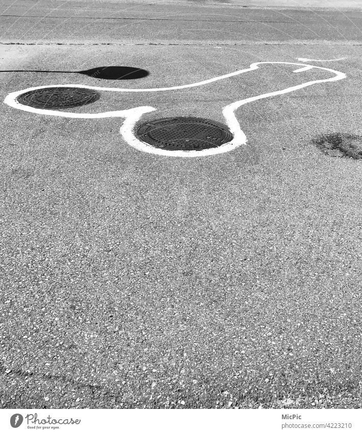 Streetart black and white street painting street art street style Graffiti Art urban Street art fallus Penis Funny manhole cover Black & white photo wittily