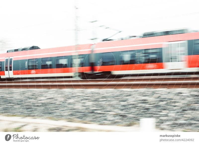 Blurry train – railway in motion abstract cargo carriage commute commuting corporate crowded depot Diesel engine fast high speed journey locomotive metro move