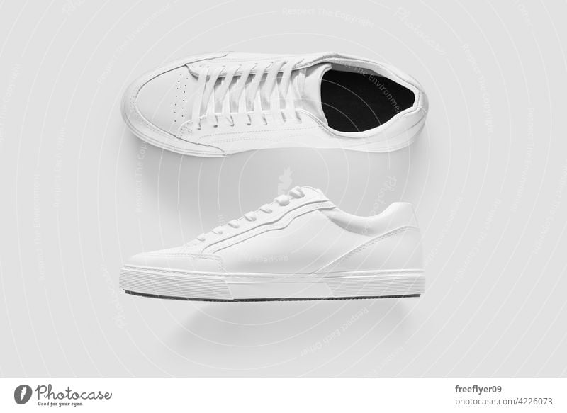 Mockup of the side and top of white generic sneakers mockup apparel isolated copy space shoes footwear e-commerce ecommerce basic white background object still