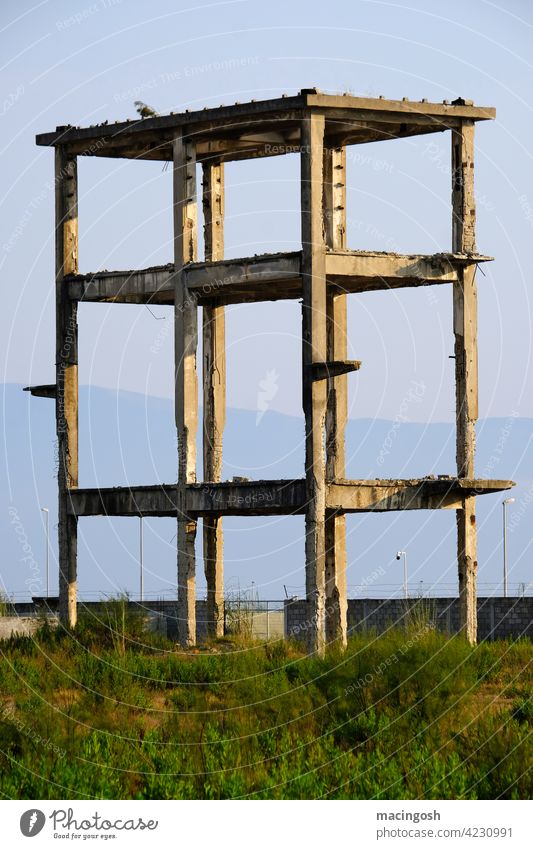 Building ruin in southeastern Europe in the late afternoon Unfinished building Albania construction boom unfinished Concrete Architecture Deserted nobody
