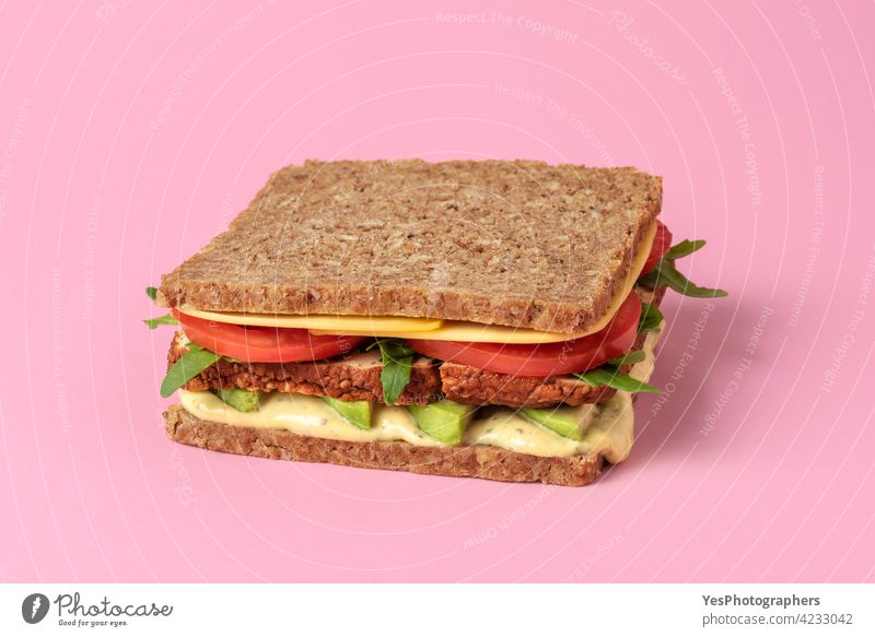 Vegan sandwich isolated on pink background. Plant-based food. alternative arugula avocado bread breakfast brown burger cheese color consumerism cuisine cut out