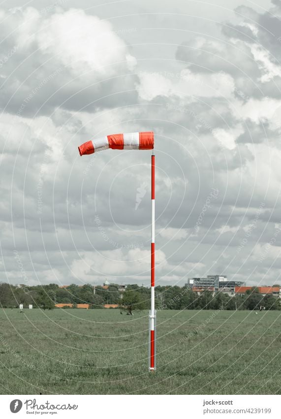 Recommendation, (alas) hence blows the strong wind! open hose Windsock Wind speed Pole Wind direction Clouds Sky Inflated Luff Lee Nature Climate Air