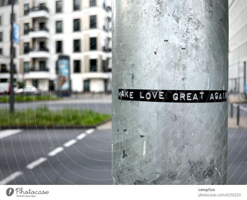 MAKE LOVE GREAT AGAIN street street art signposts message Love embassy In love Lantern Lamp post Street urban Art make love not war Large City Cologne
