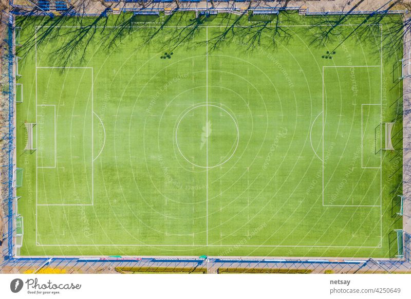Aerial view of empty soccer field in Europe top football aerial court pitch above drone stadium texture goal lawn area backdrop background center color