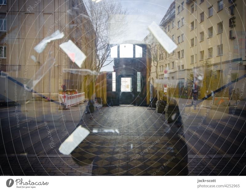 photograph through a reflecting glass pane Passage Silhouette Reflection Pane Window pane Downtown Berlin adhesive tape house facade Tile Sky bare tree