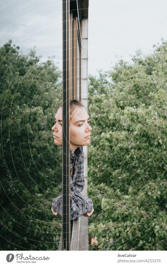 Woman worried while showing off the window in the city during a spring day, mental health concept anxiety woman frustration problem sad sadness solitude sorrow