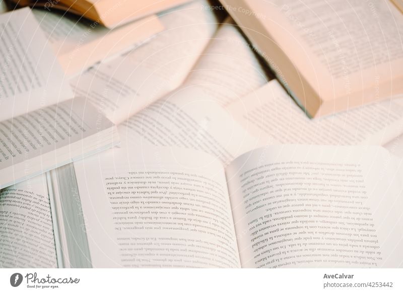 Close up of a bunch of books background with copy space minimal and reading concept education person library literature open page school student paper cover