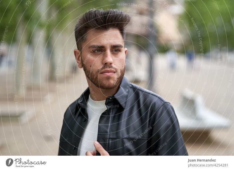 caucasian man with beard, dressed in black leather jacket young guy professional model stylish fashionable handsome shirt standing posing success cool elegant