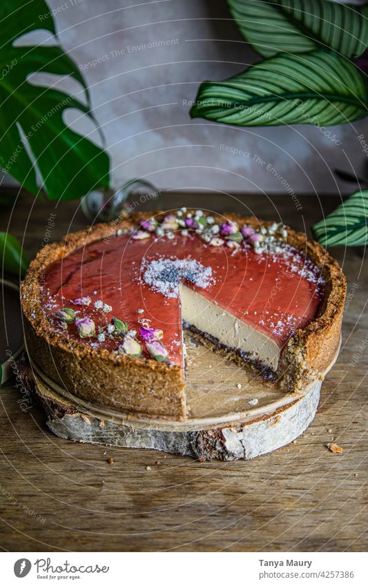 baked vegan cheesecake with poppy flower syrup Gateau Dessert Cake Studio shot Food photograph Eating Still Life organic homemade non dairy Vegan diet Fruit