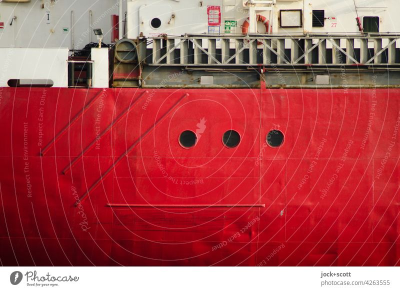 Red ship wall with three portholes from fat freighter ship's side Detail Background picture Structures and shapes Authentic Ship's side Steel Porthole Maritime