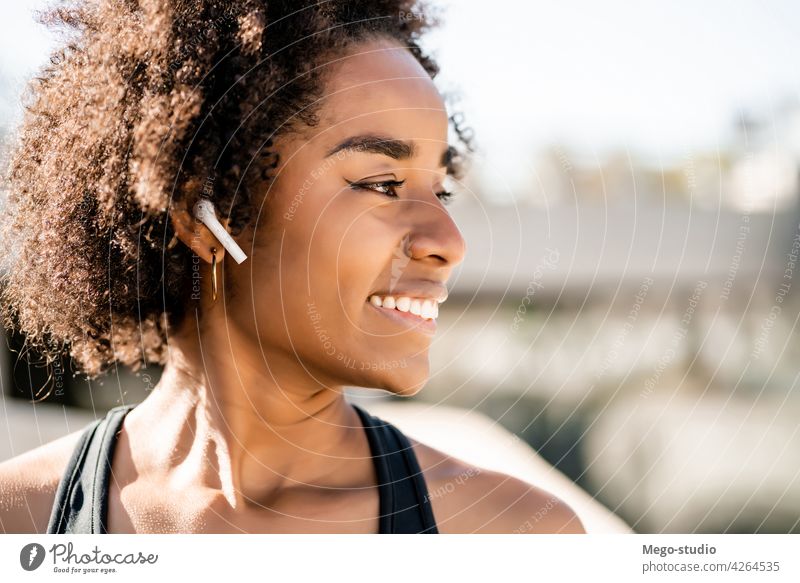 Afro athlete woman standing outdoors. fitness sport exercise resting break relax enjoying relaxation leisure city sporty relaxing sportswoman active health