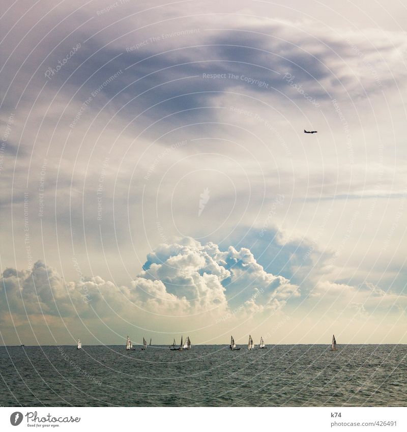 seascape Summer Ocean Waves Water Sky Clouds Storm clouds Weather Means of transport Navigation Boating trip Sailboat Aviation Airplane Driving Flying Blue