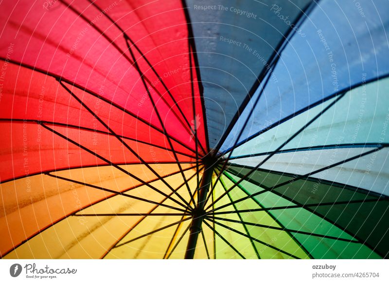 close up of umbrella rain rainbow blue colour protection sun nature background safety weather parasol color colorful yellow autumn spring colourful open outside