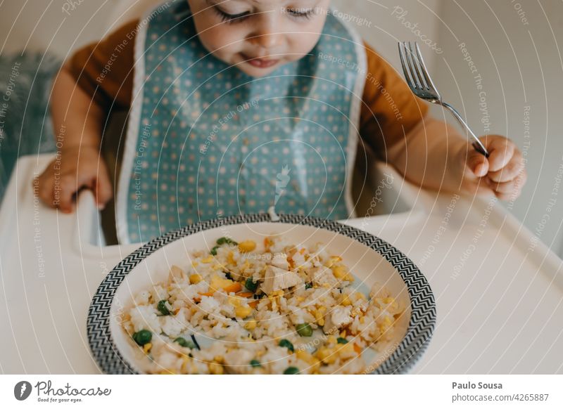 Child eating with fork childhood Eating Fork kid Close-up Infancy Delicious vegetables Colour photo Plate Healthy Eating Nutrition Food Authentic food Lunch